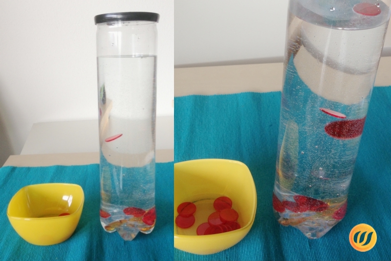 Dose mit Wasser und Knöpfen